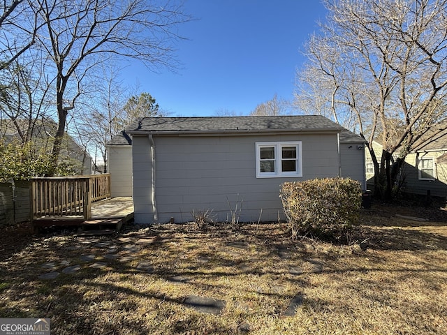 view of property exterior featuring a deck