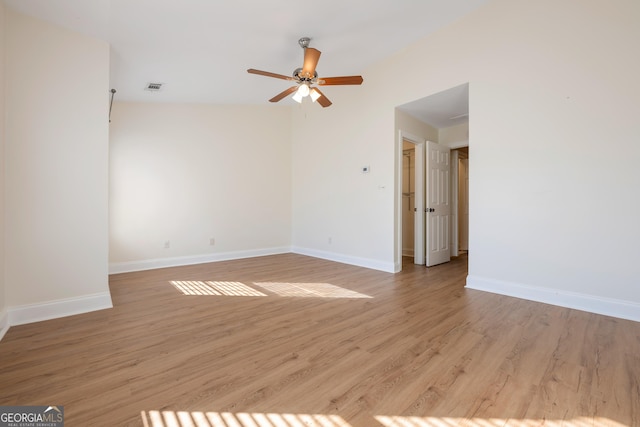 spare room with ceiling fan and light hardwood / wood-style floors