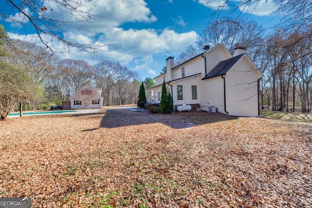 view of property exterior with a garage