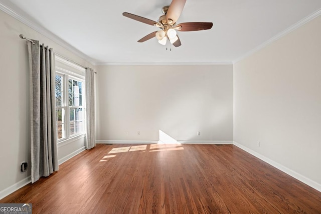 unfurnished room with ceiling fan, wood-type flooring, and crown molding