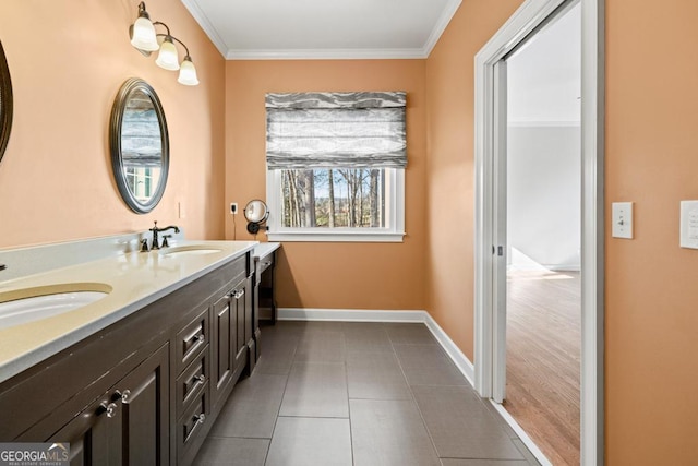 bathroom with tile patterned floors, vanity, and ornamental molding