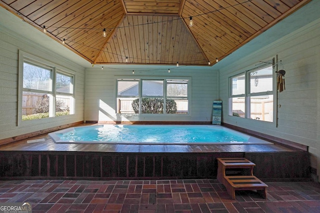 view of pool featuring an indoor hot tub