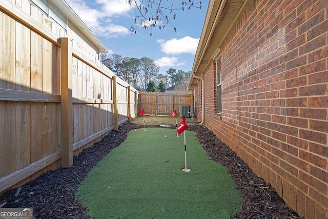 view of yard featuring central AC unit