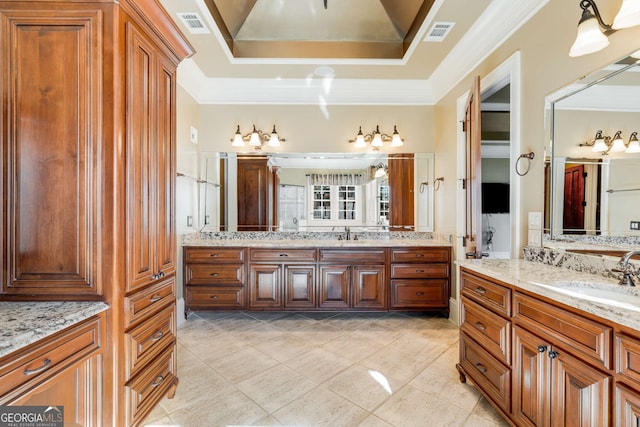 bathroom featuring tile patterned floors, vanity, and ornamental molding