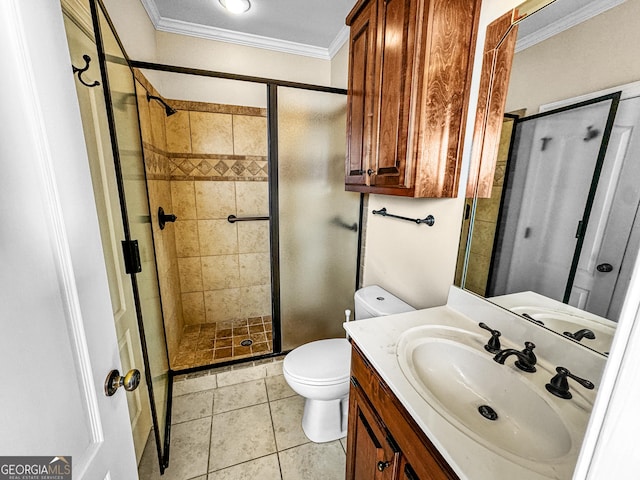 bathroom with crown molding, tile patterned flooring, vanity, toilet, and walk in shower