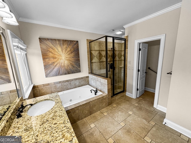 bathroom featuring vanity, ornamental molding, and separate shower and tub