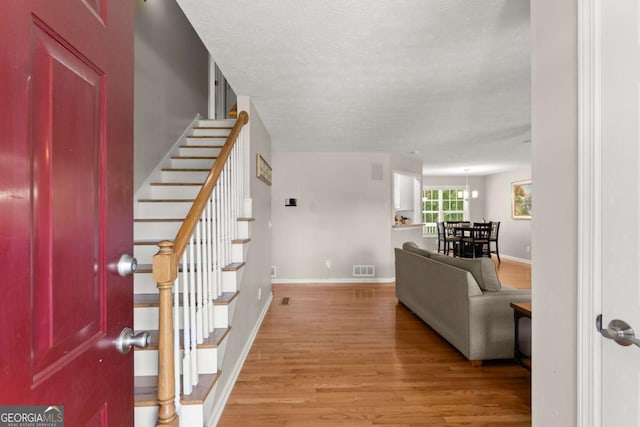 foyer entrance featuring light hardwood / wood-style floors