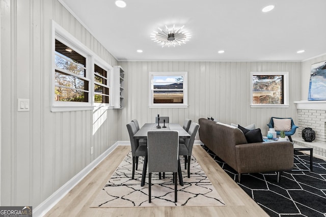 dining area with light hardwood / wood-style flooring