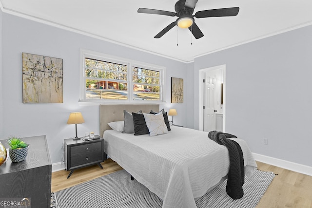 bedroom with ceiling fan, ornamental molding, and light wood-type flooring