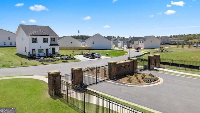 view of community featuring a yard