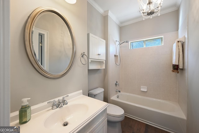 full bath with a notable chandelier, crown molding, toilet, tub / shower combination, and vanity