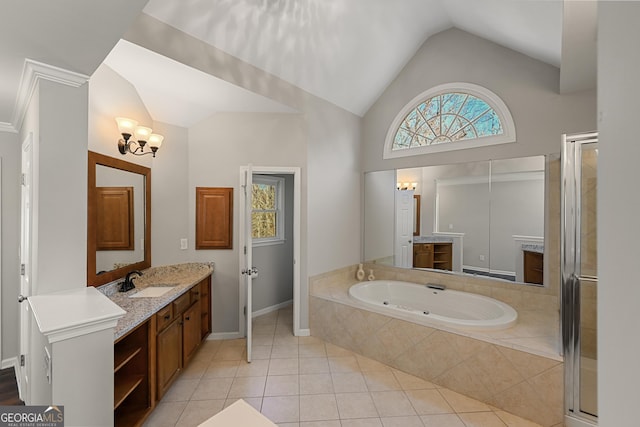 full bath featuring a shower stall, vanity, and tile patterned floors