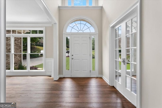 entrance foyer with dark wood-style flooring