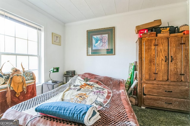 bedroom with crown molding