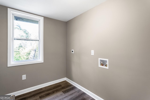 laundry area featuring a wealth of natural light, dark hardwood / wood-style flooring, washer hookup, and hookup for an electric dryer