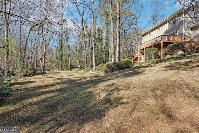 view of yard featuring a deck