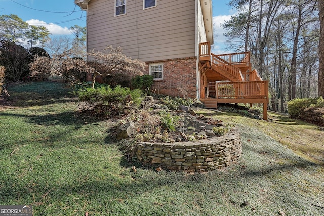 view of yard featuring a deck