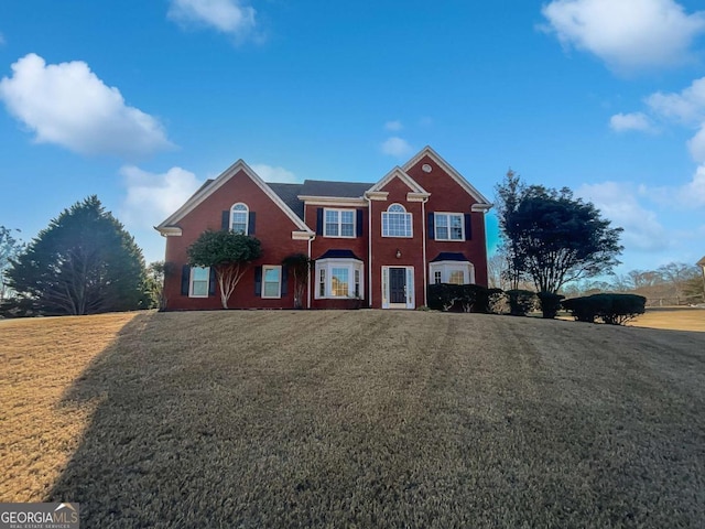 view of front of home featuring a front lawn