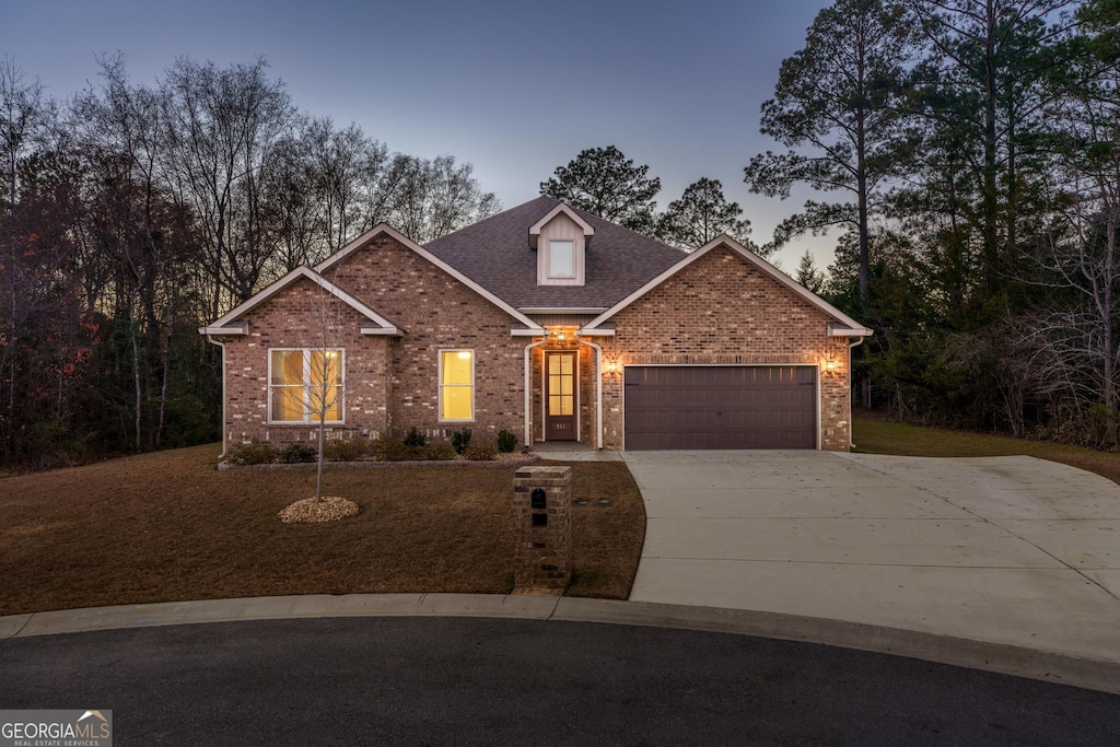 front facade with a garage