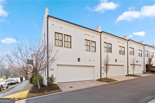 view of property featuring a garage