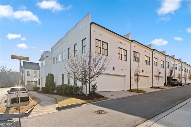 view of building exterior featuring a garage