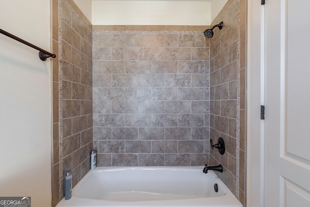 bathroom featuring tiled shower / bath combo