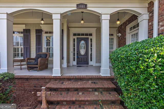 property entrance featuring a porch