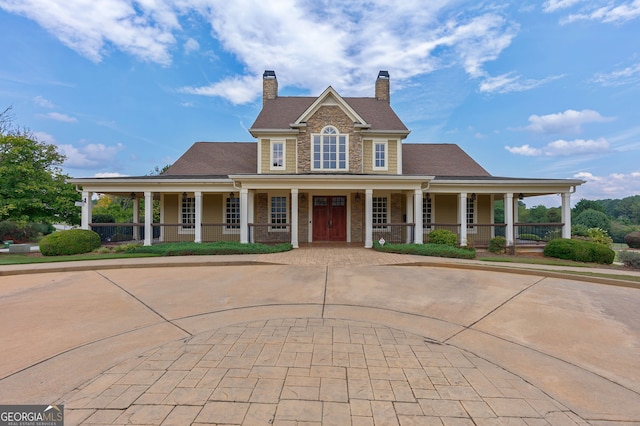 view of front of property featuring covered porch