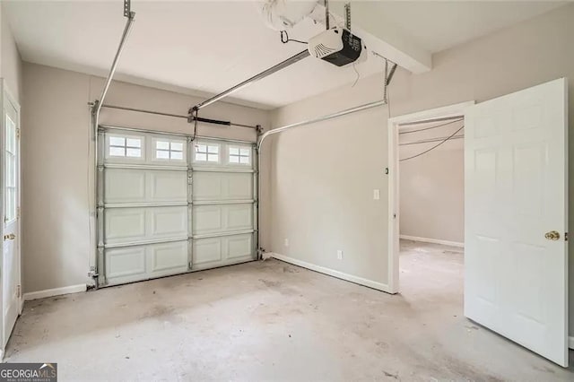 garage featuring a garage door opener