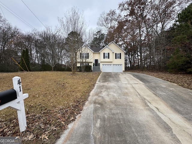 view of front of property featuring a garage