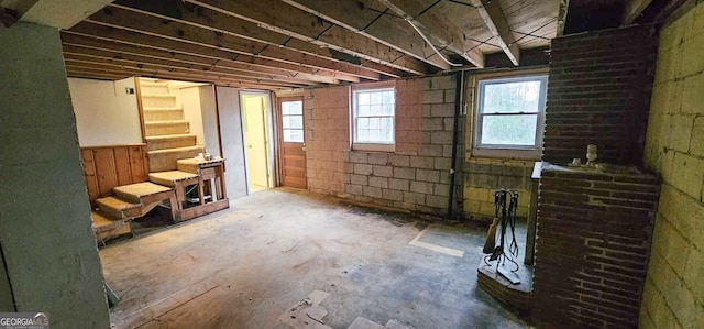 misc room with concrete flooring