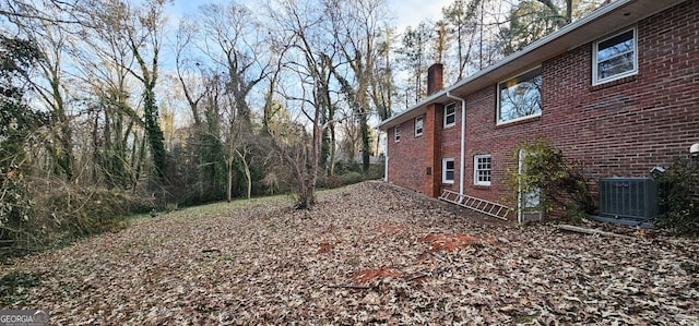 view of yard featuring central AC