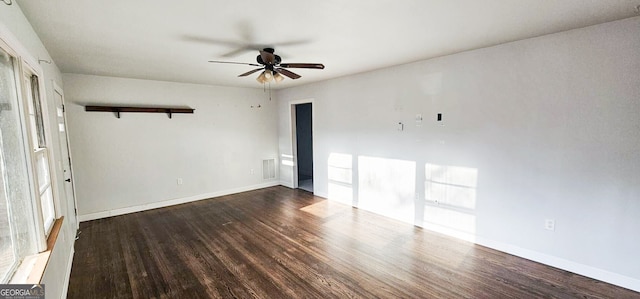 unfurnished bedroom featuring ceiling fan and dark hardwood / wood-style flooring