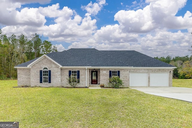 ranch-style home featuring a garage and a front lawn