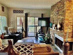 living room with a fireplace