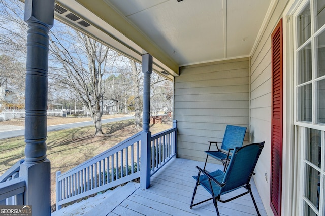 deck featuring covered porch