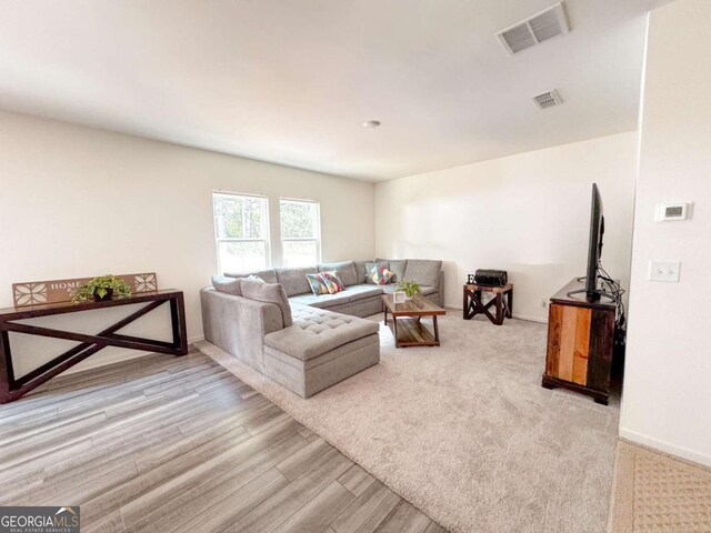 living room featuring light hardwood / wood-style floors