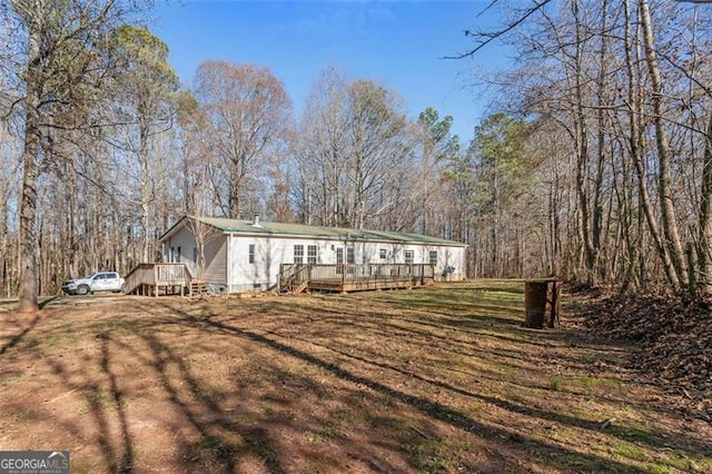 view of front of home with a deck