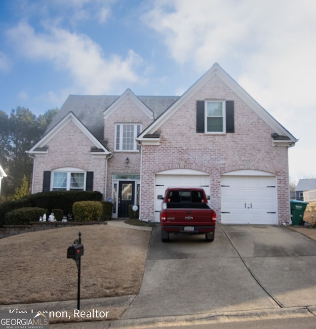 view of property featuring a garage