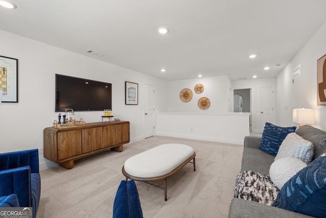 living room featuring light carpet