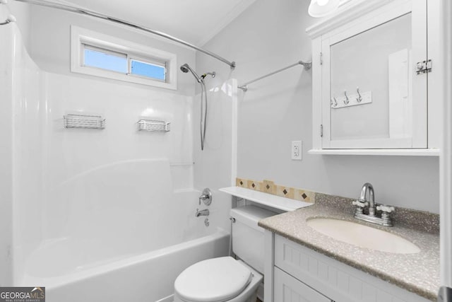 full bathroom featuring vanity, toilet, tub / shower combination, and crown molding