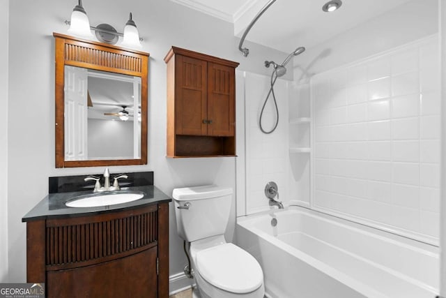 full bathroom with ceiling fan, toilet, vanity, bathtub / shower combination, and ornamental molding