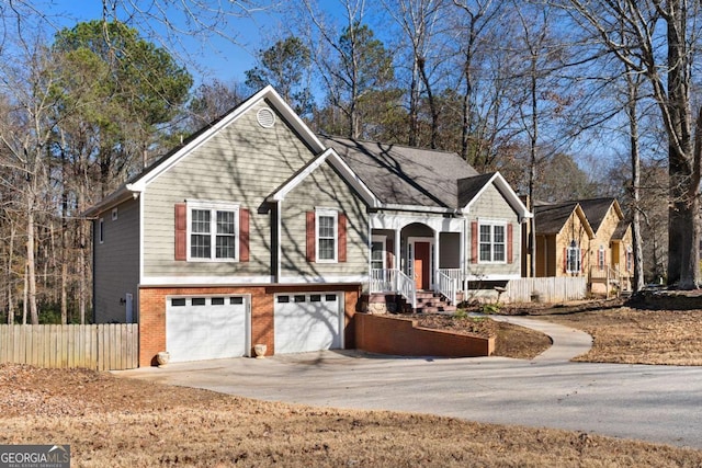 split foyer home featuring a porch and a garage