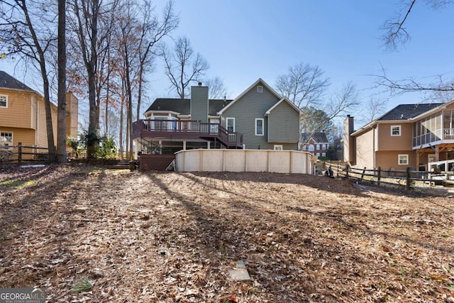 rear view of property with a deck