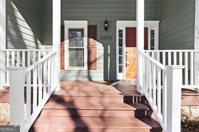 doorway to property with a porch