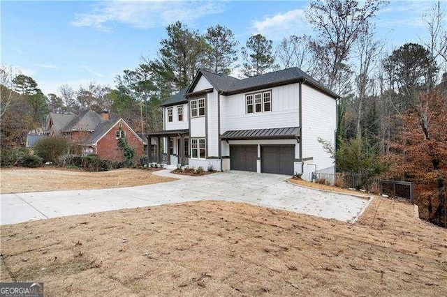 front of property featuring a garage