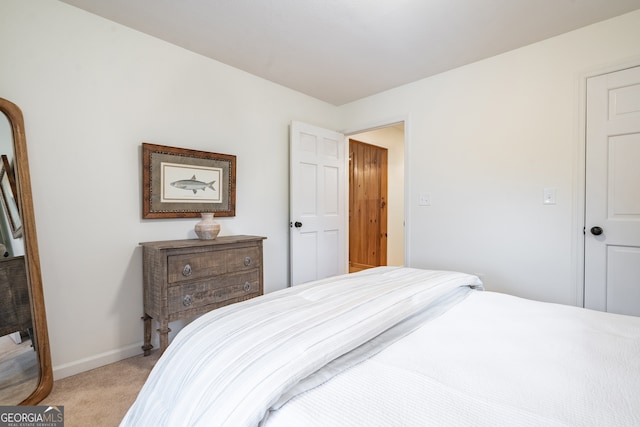 bedroom with light carpet