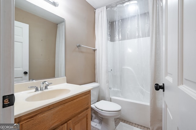 full bathroom featuring tile patterned floors, vanity, toilet, and shower / tub combo with curtain