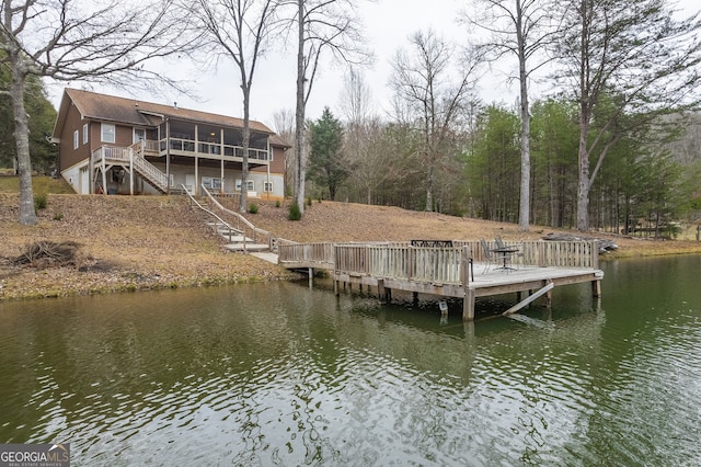 dock area with a deck with water view