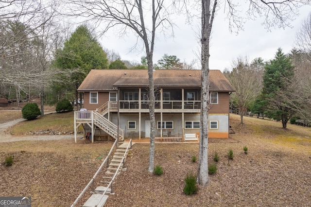 view of front facade featuring a sunroom